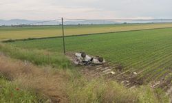 Adana'da kaygan yolda takla atan araç tarlaya devrildi