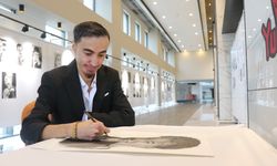 SAVI hastası Yunus Can iki parmağıyla sergi açtı