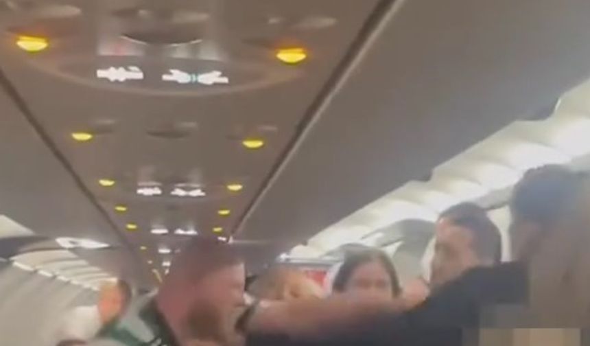 Uçakta İskoç yolcu polise yumrukla saldırdı
